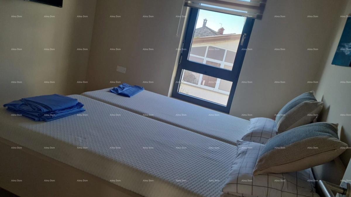 Appartamento moderno nel blocco E, con posto auto e ripostiglio vicino a Umago!