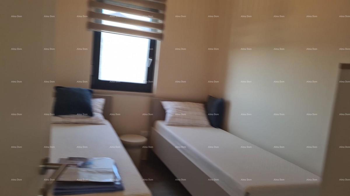 Appartamento moderno nel blocco E, con posto auto e ripostiglio vicino a Umago!