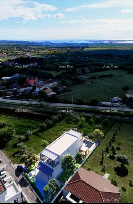 Vendiamo una bellissima casa duplex con piscina e vista sul mare e Brioni, a Gallesano