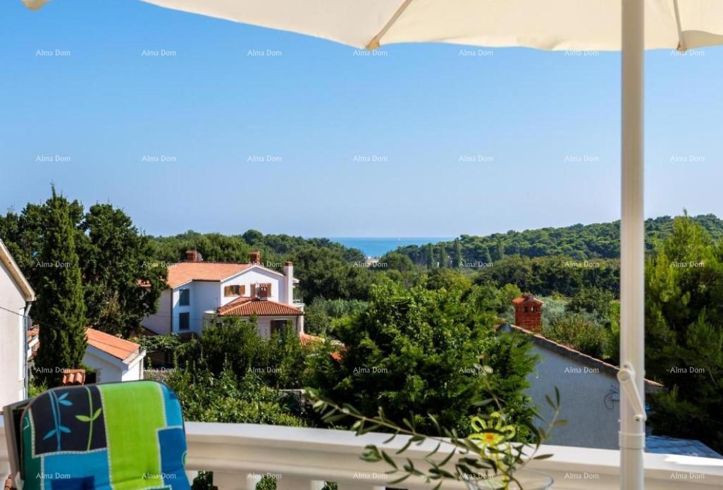 Casa con appartamenti e piscina a Premantura – vista mare!