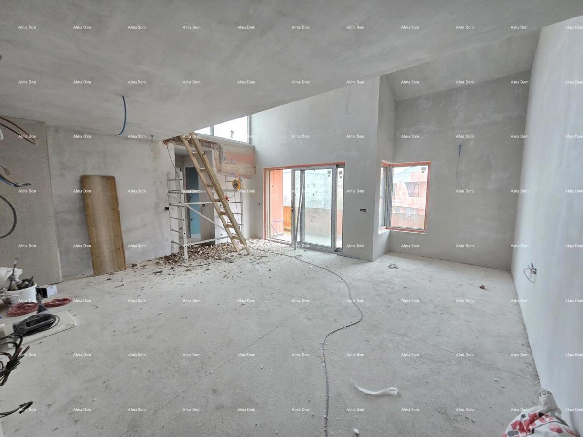 Parenzo, edificio residenziale e commerciale in costruzione con appartamenti e garage sotterranei