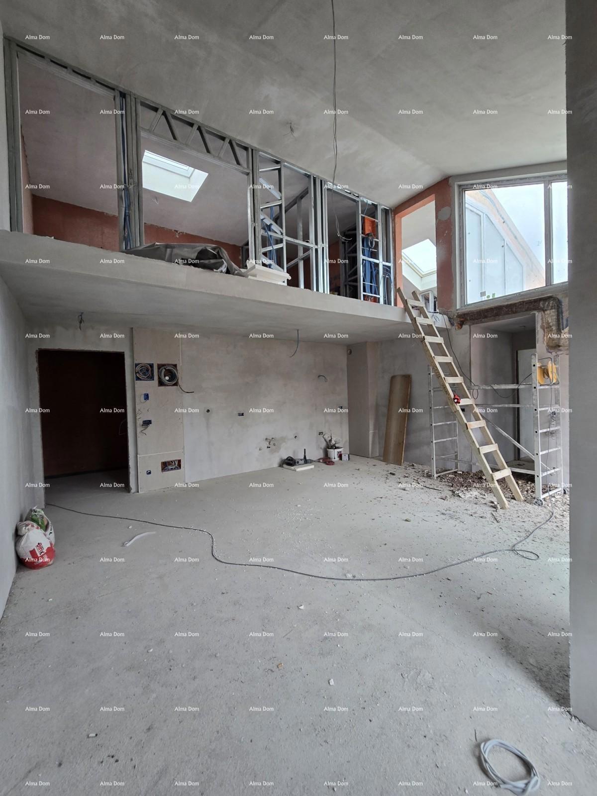 Parenzo, edificio residenziale e commerciale in costruzione con appartamenti e garage sotterranei