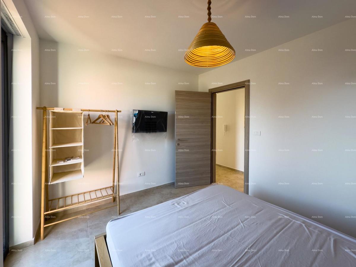 Mukalba. Medolino. Appartamento in un nuovo edificio con la propria piscina