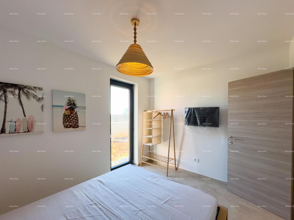 Mukalba. Medolino. Appartamento in un nuovo edificio con la propria piscina