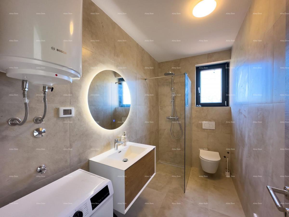 Mukalba. Medolino. Appartamento in un nuovo edificio con la propria piscina