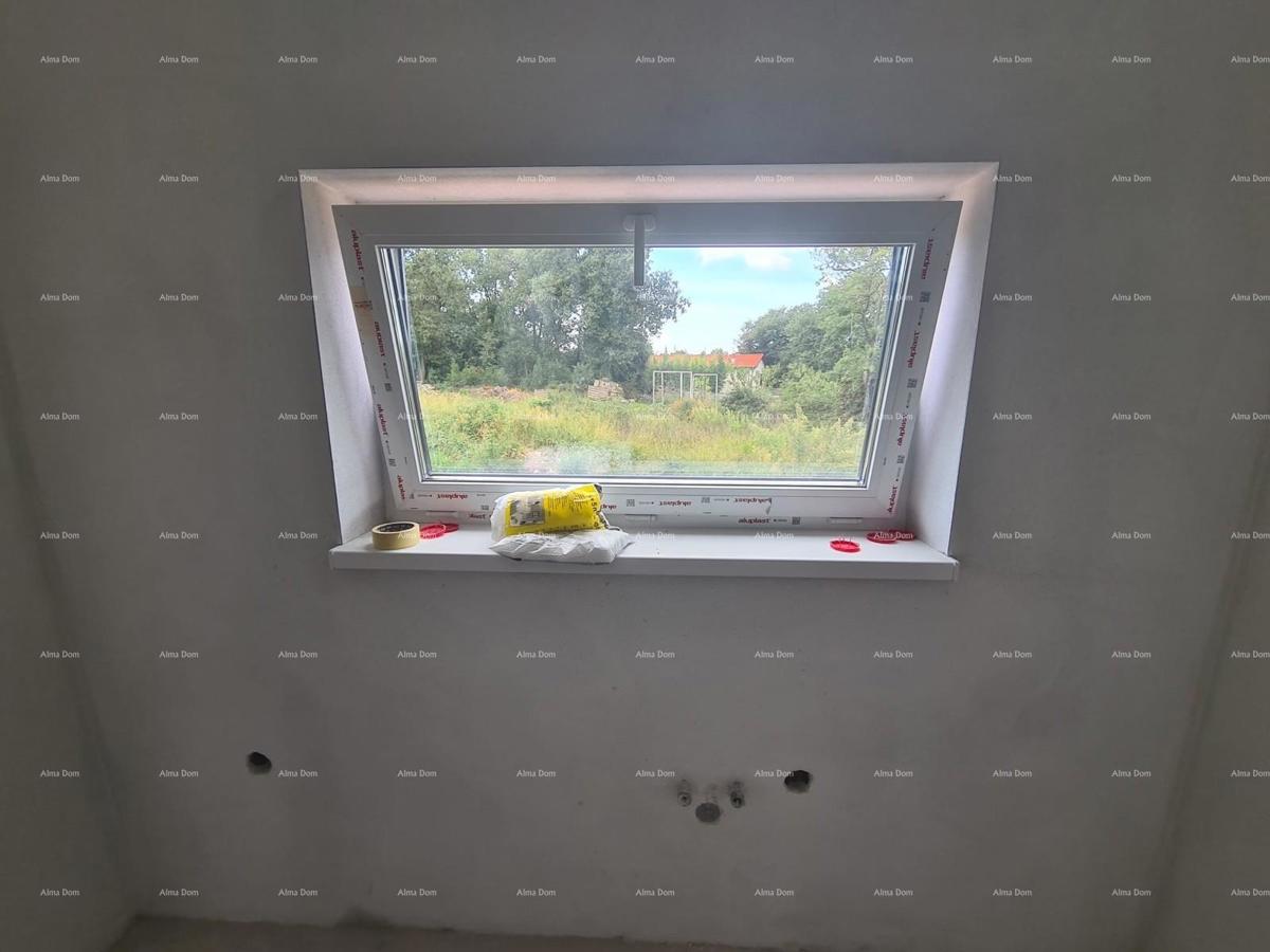 In vendita appartamento su due piani con giardino a Ližnjan