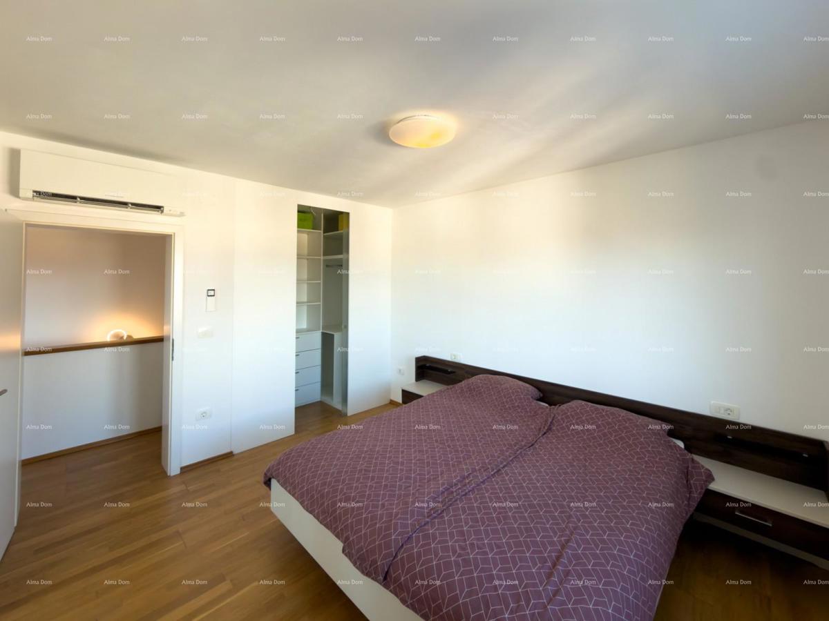 In vendita una casa attraente a Premantura con vista mare.