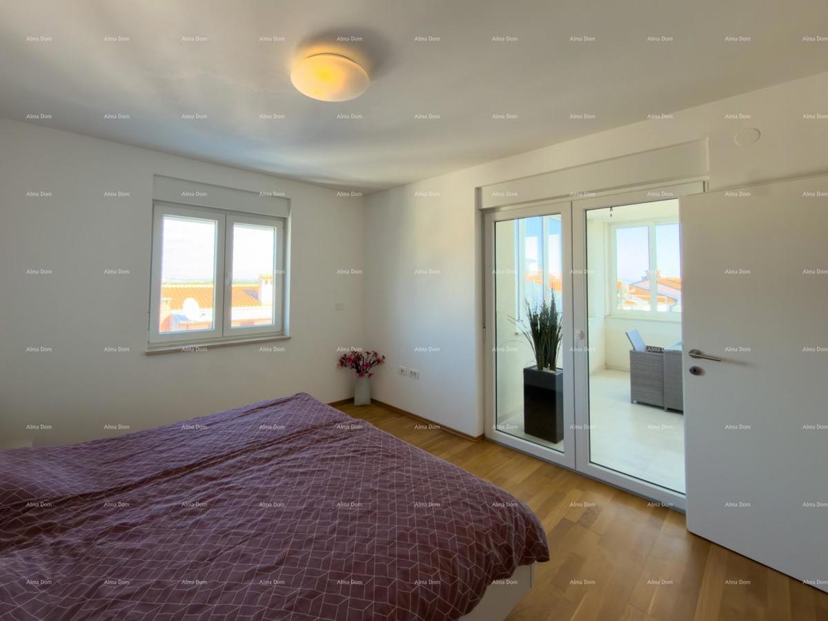 In vendita una casa attraente a Premantura con vista mare.