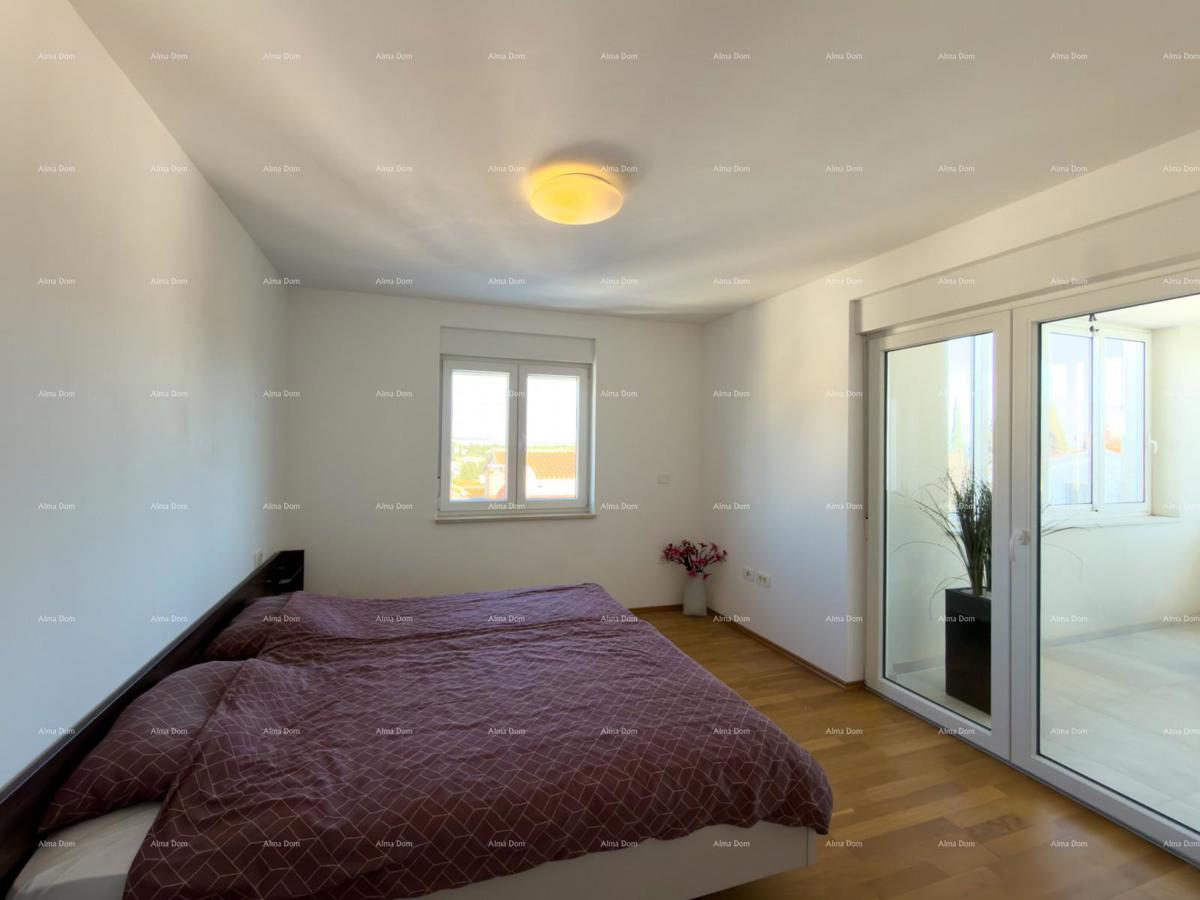 In vendita una casa attraente a Premantura con vista mare.