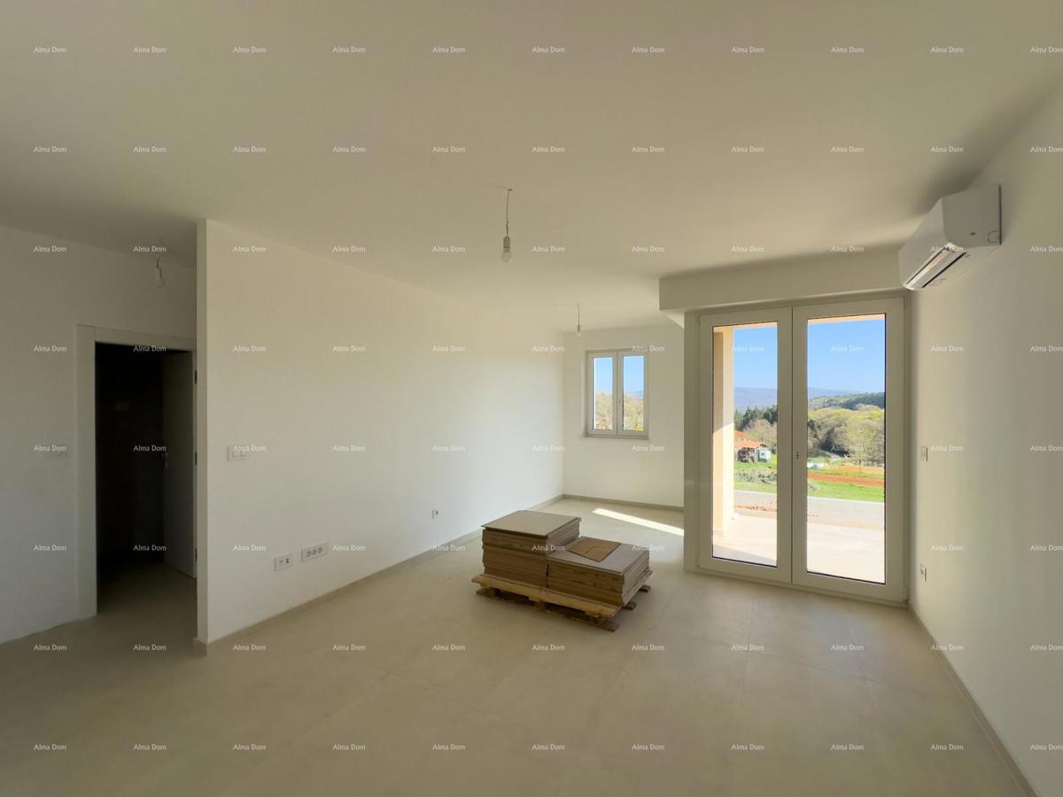 Vendiamo un appartamento con un grande giardino a Barban.