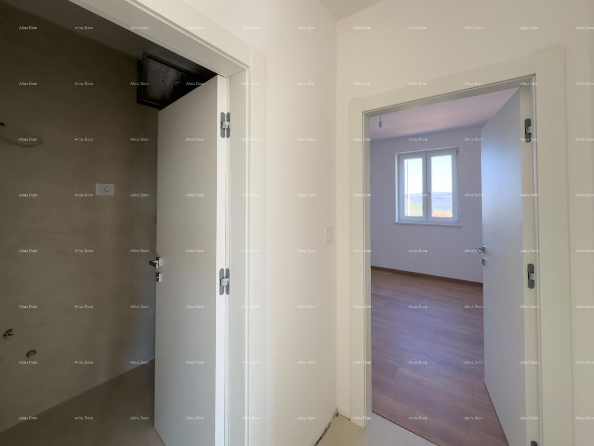 Vendiamo un appartamento con un grande giardino a Barban.