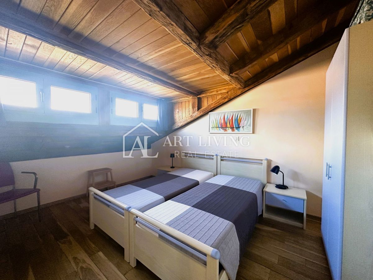 Parenzo, dintorni – affascinante appartamento bilocale con utilizzo della piscina e del campo da tennis