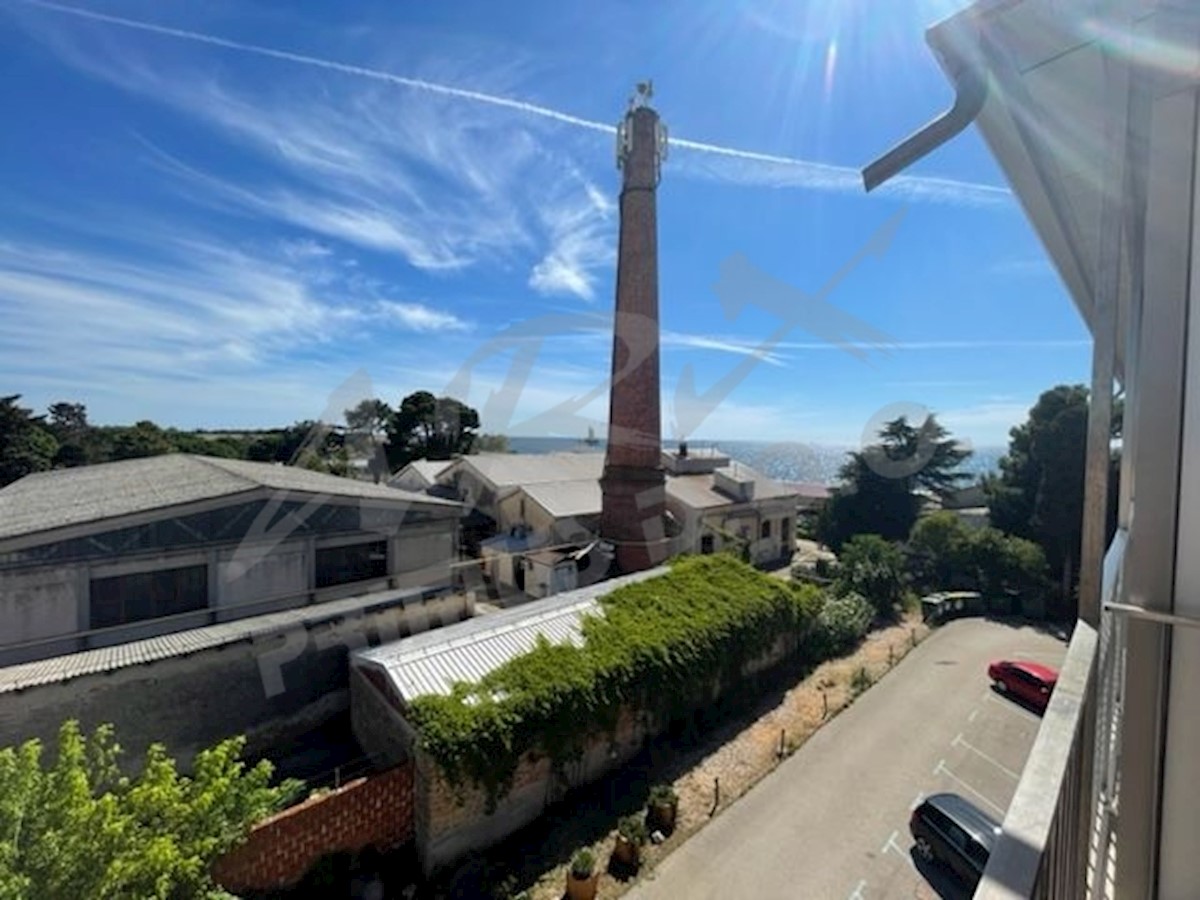 Appartamento in centro città con vista mare