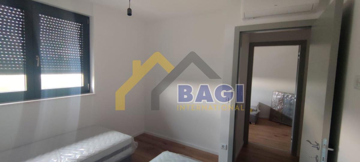 Pula-Attico 120m2-Nuova costruzione-2 posti auto-arredato