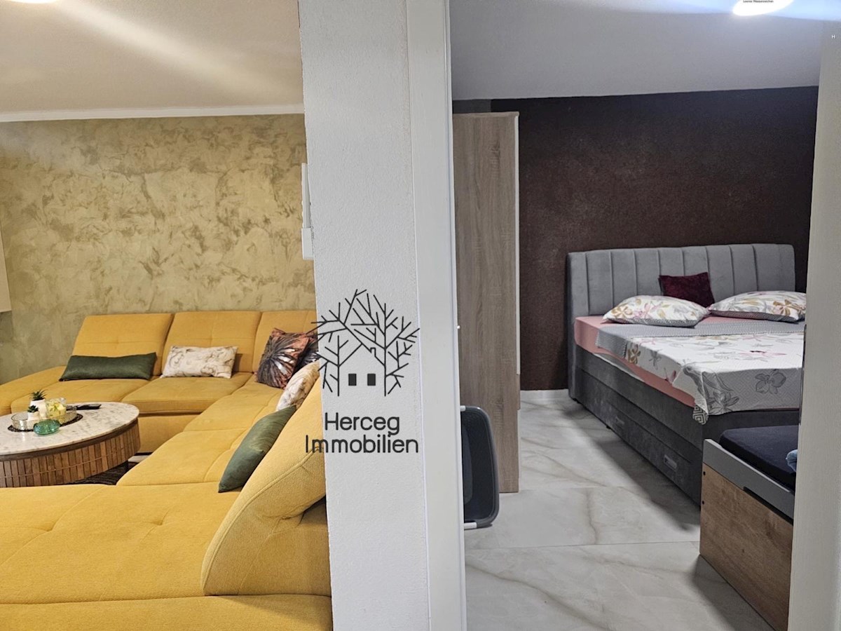 MEDULIN – Appartamento al piano terra con giardino