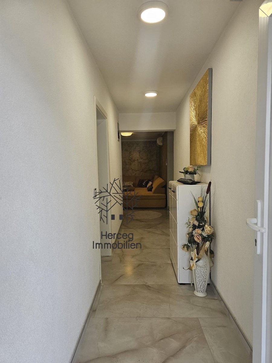 MEDULIN – Appartamento al piano terra con giardino