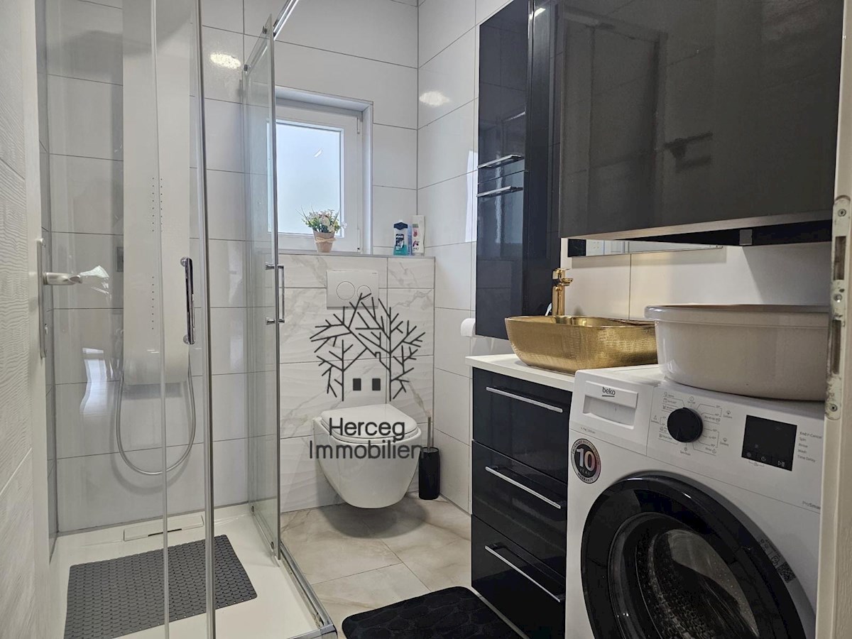 MEDULIN – Appartamento al piano terra con giardino