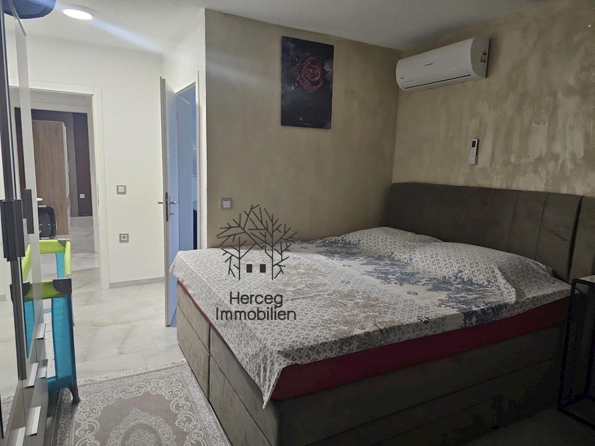 MEDULIN – Appartamento al piano terra con giardino