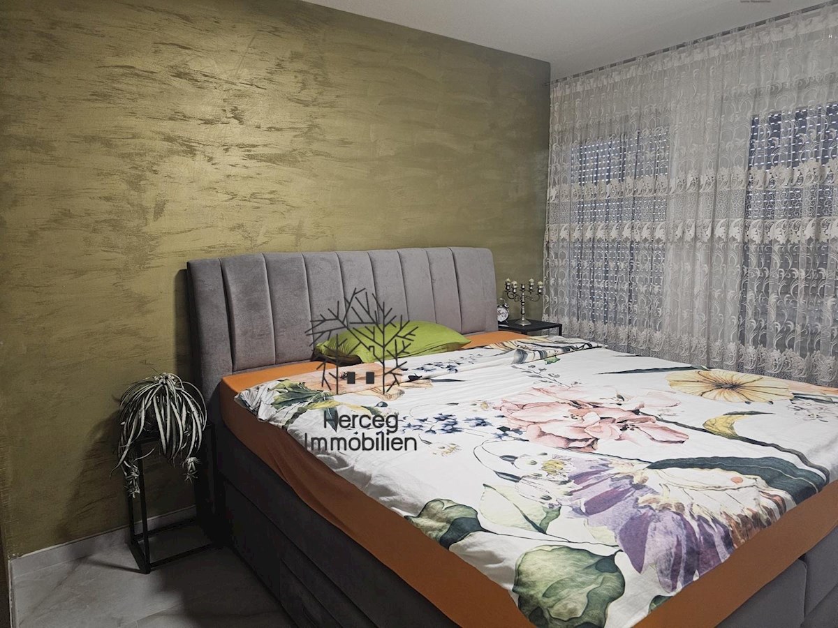 MEDULIN – Appartamento al piano terra con giardino