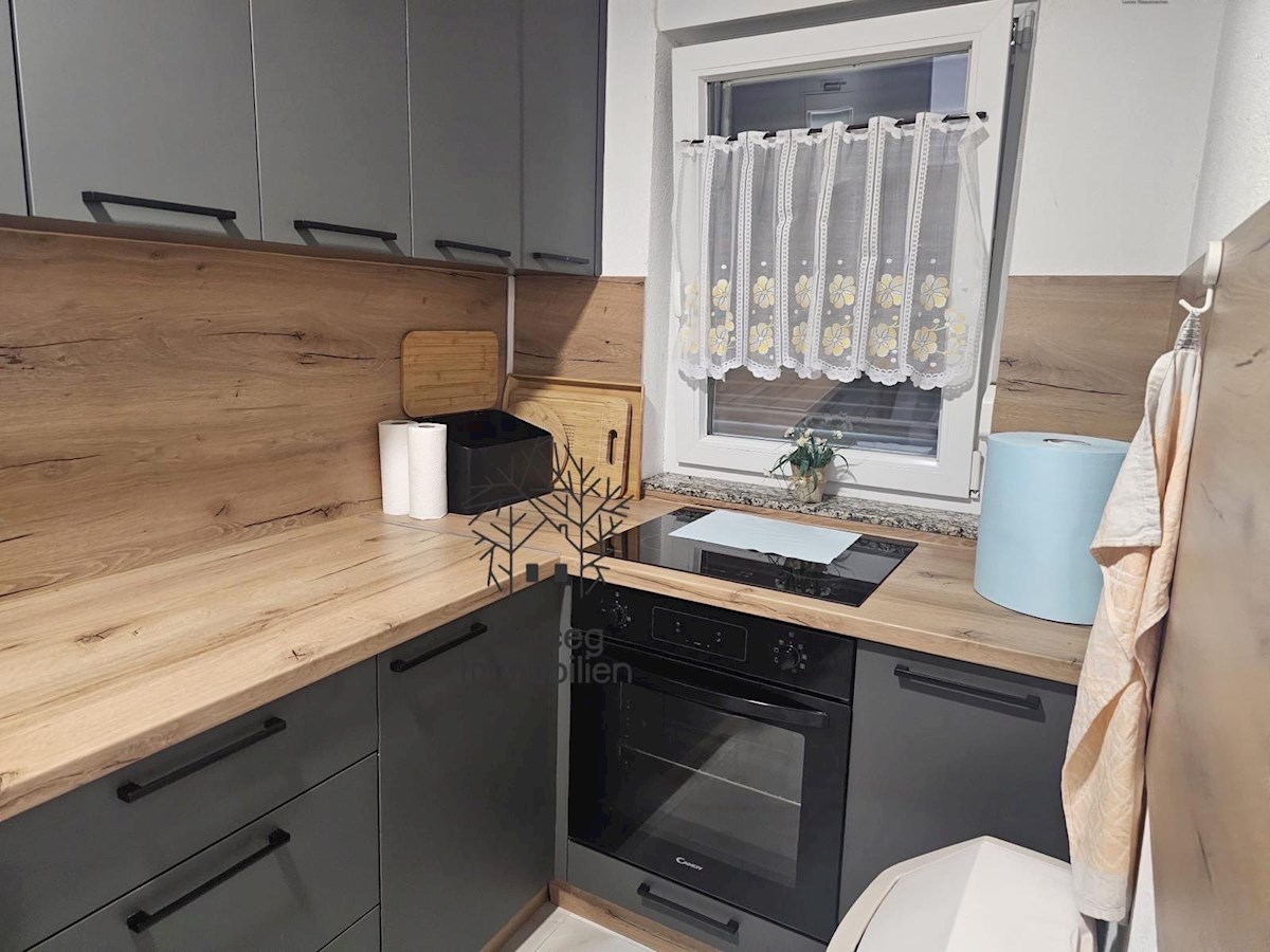 MEDULIN – Appartamento al piano terra con giardino