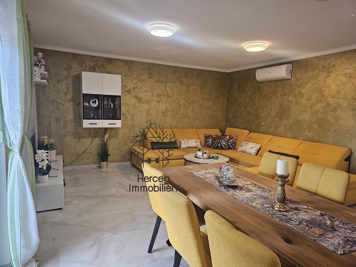 MEDULIN – Appartamento al piano terra con giardino