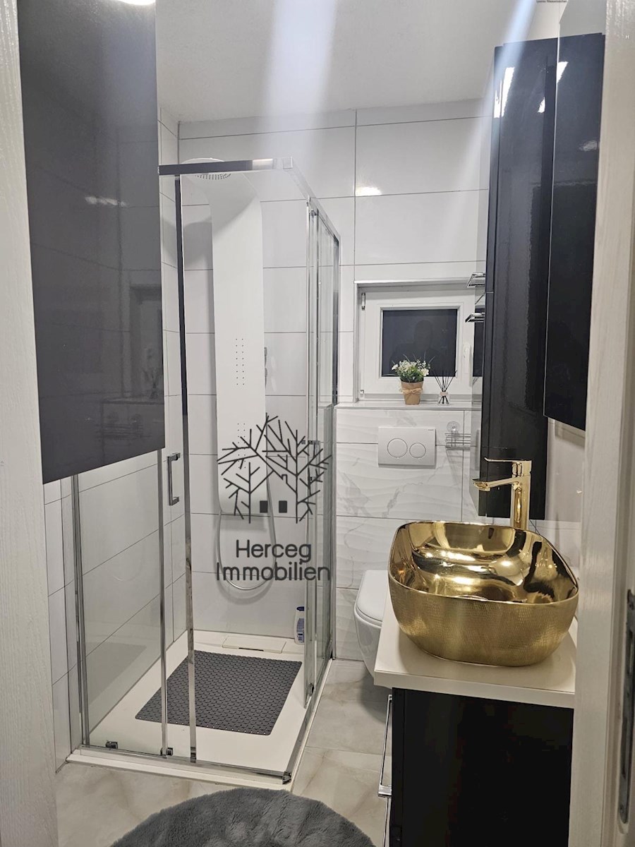 MEDULIN – Appartamento al piano terra con giardino