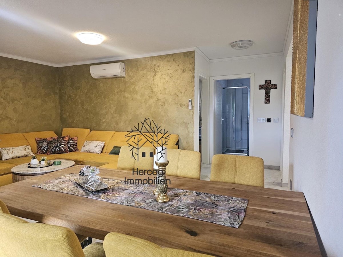 MEDULIN – Appartamento al piano terra con giardino