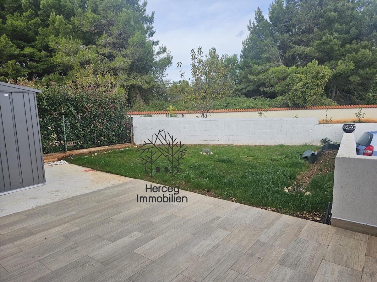 MEDULIN – Appartamento al piano terra con giardino