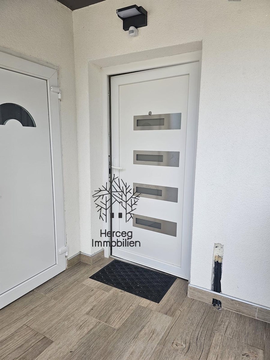 MEDULIN – Appartamento al piano terra con giardino