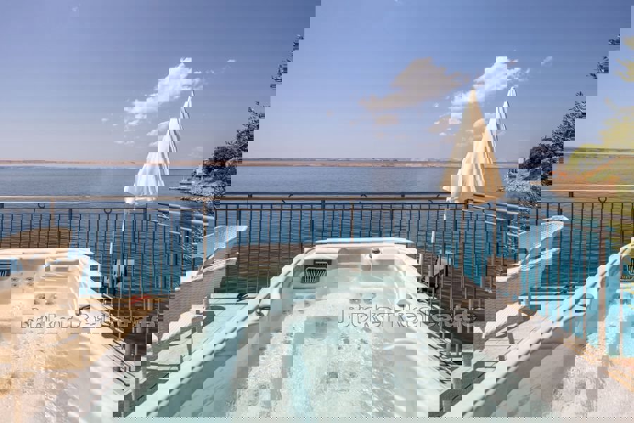 Affascinante casa in prima fila al mare