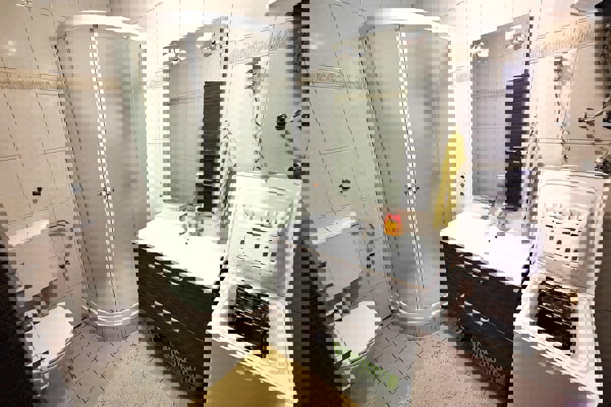 Appartamento con giardino e vista mare