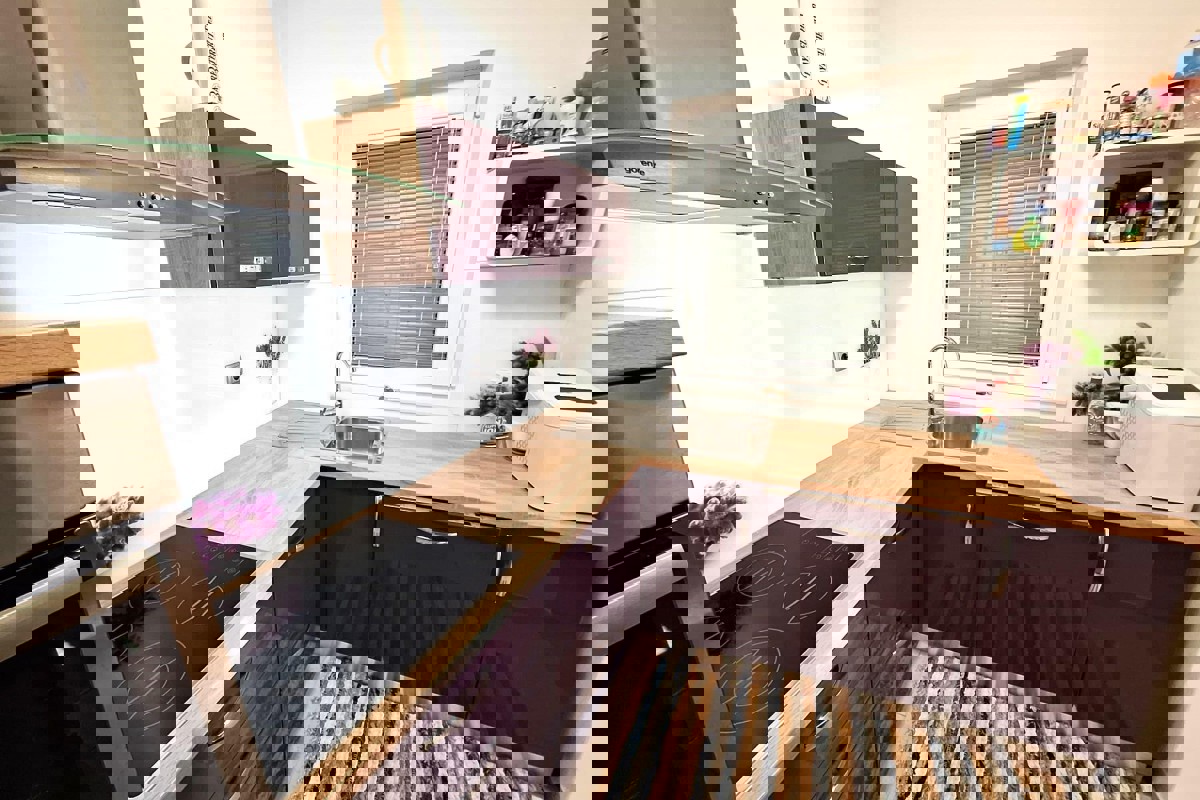 Appartamento con giardino e vista mare