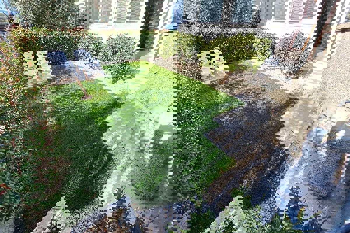 Appartamento con giardino e vista mare