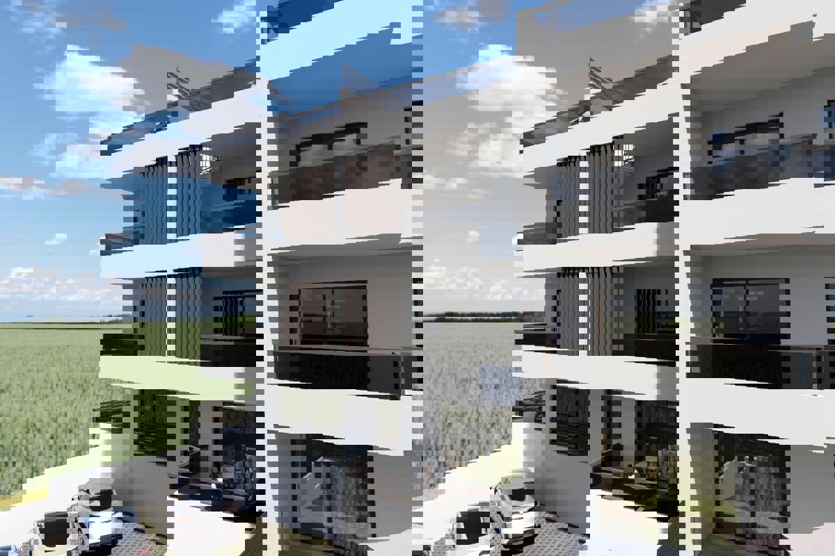 Attico con terrazza sul tetto e posto auto