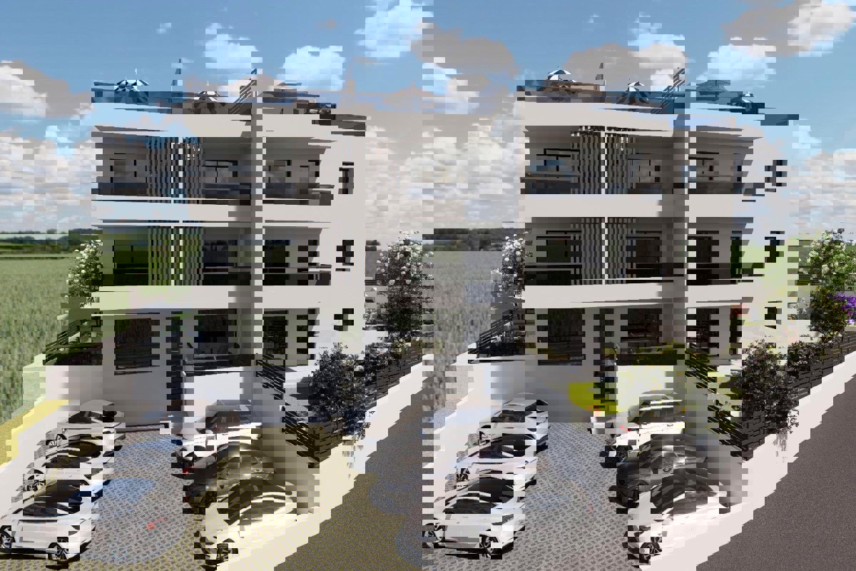 Attico con terrazza sul tetto e posto auto