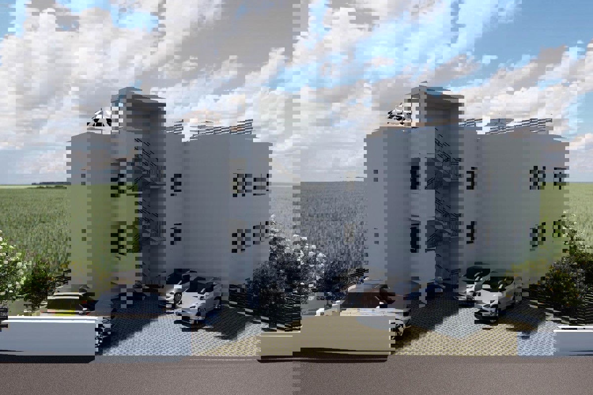 Attico con terrazza sul tetto e posto auto