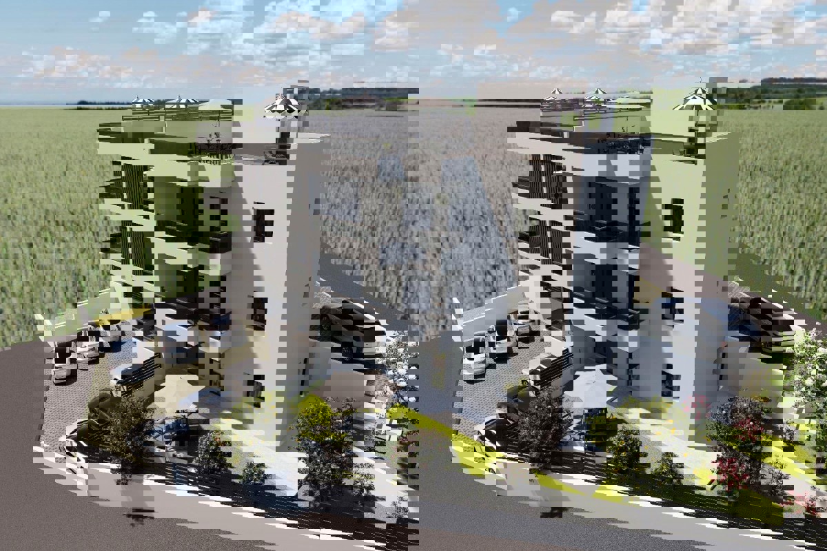 Attico con terrazza sul tetto e posto auto