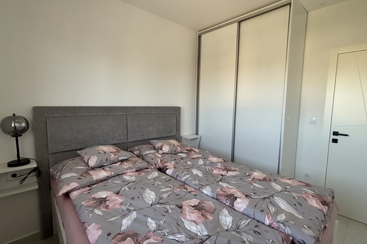 Straordinario attico con terrazza panoramica e vista mare aperta