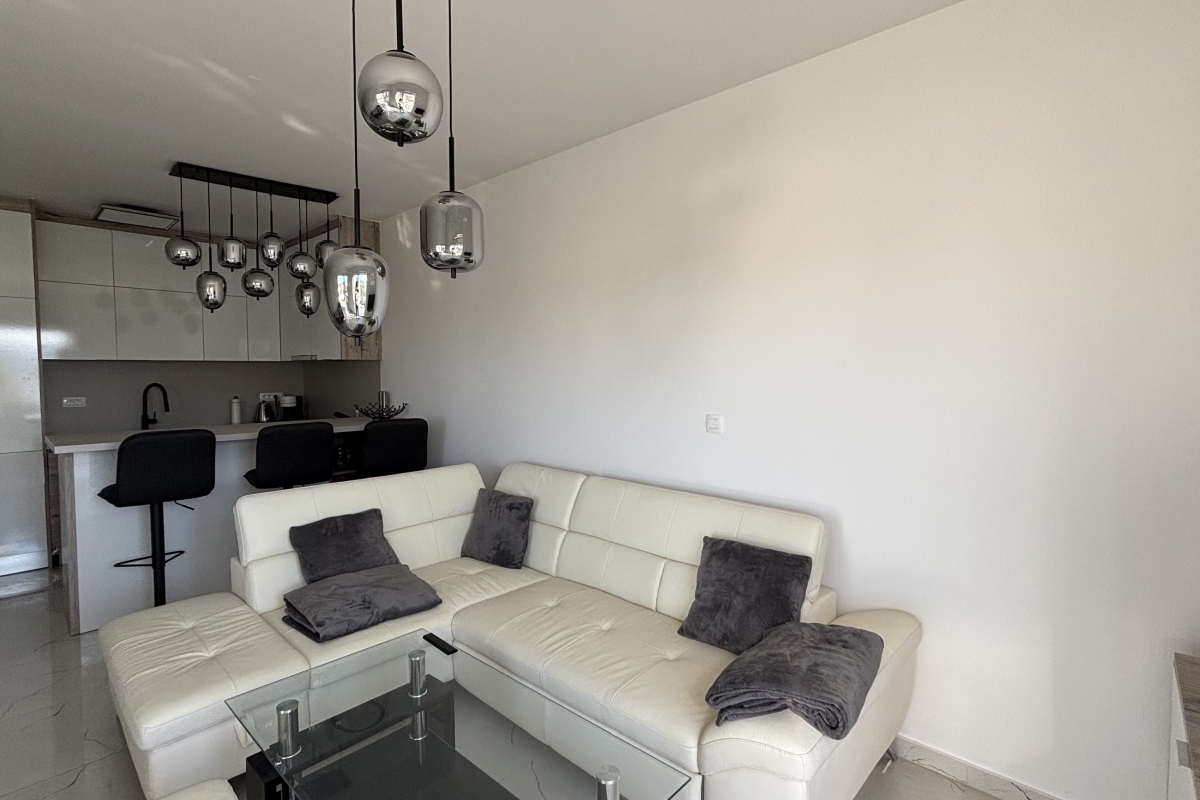 Straordinario attico con terrazza panoramica e vista mare aperta