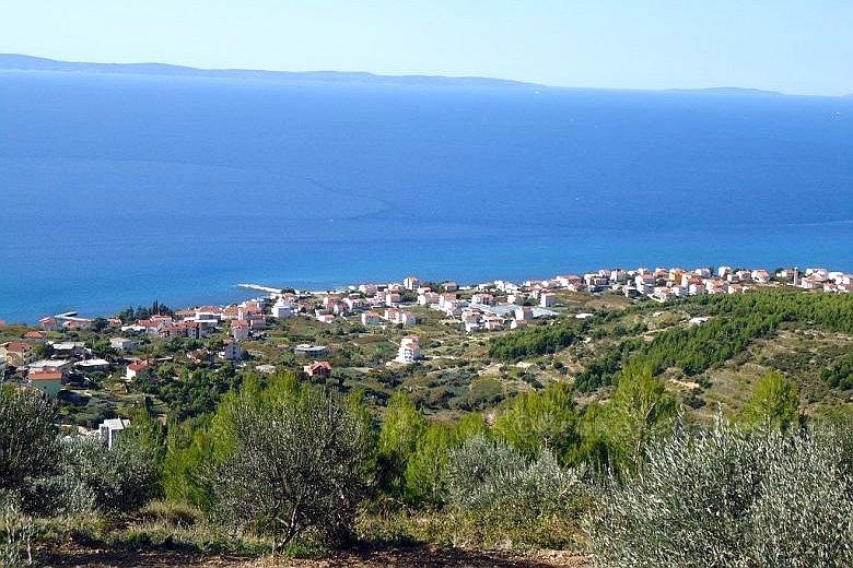 Casa bifamiliare con vista sul mare aperto, in vendita