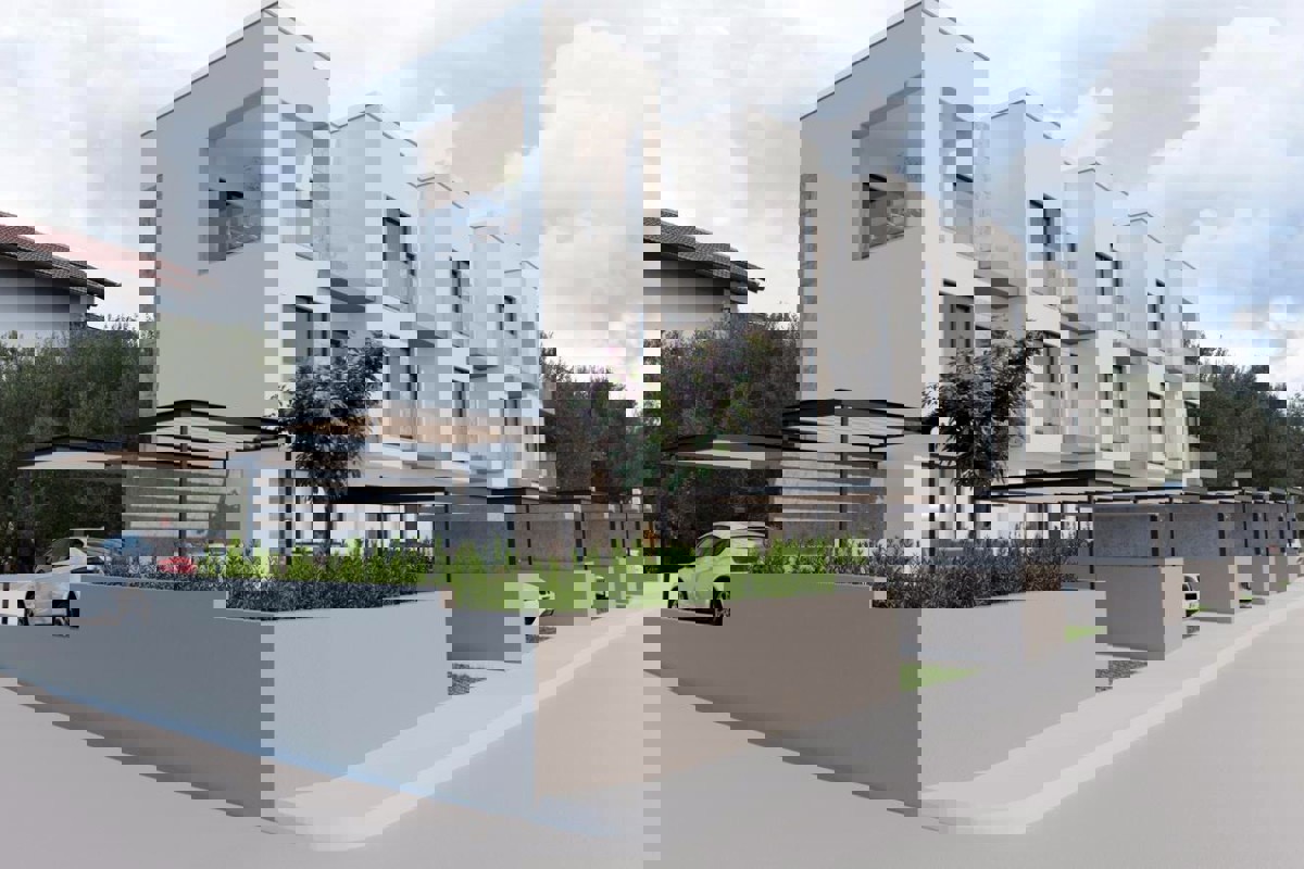 Appartamento duplex con giardino e parcheggio