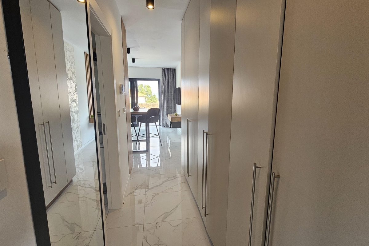 Attico con due zone giorno separate