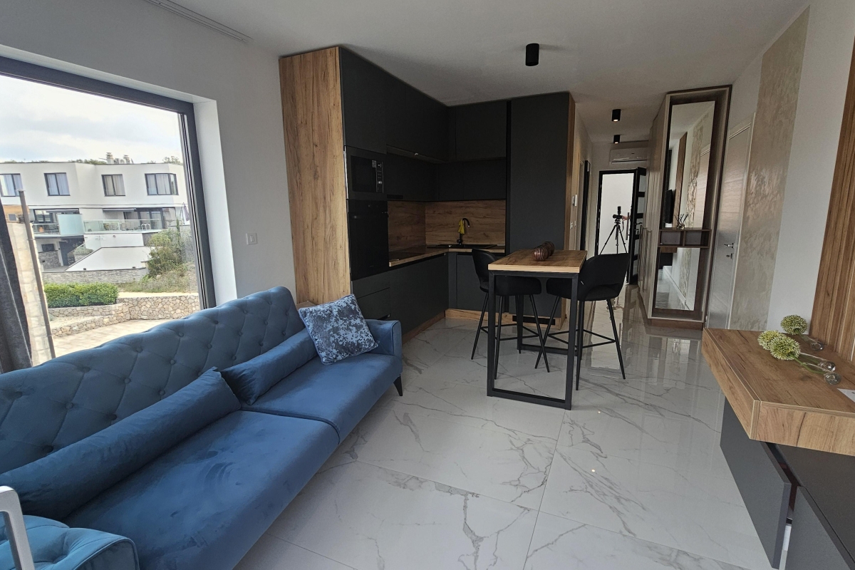 Attico con due zone giorno separate