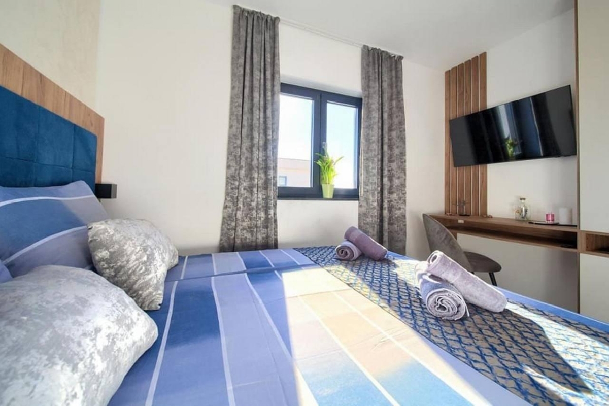 Attico con due zone giorno separate