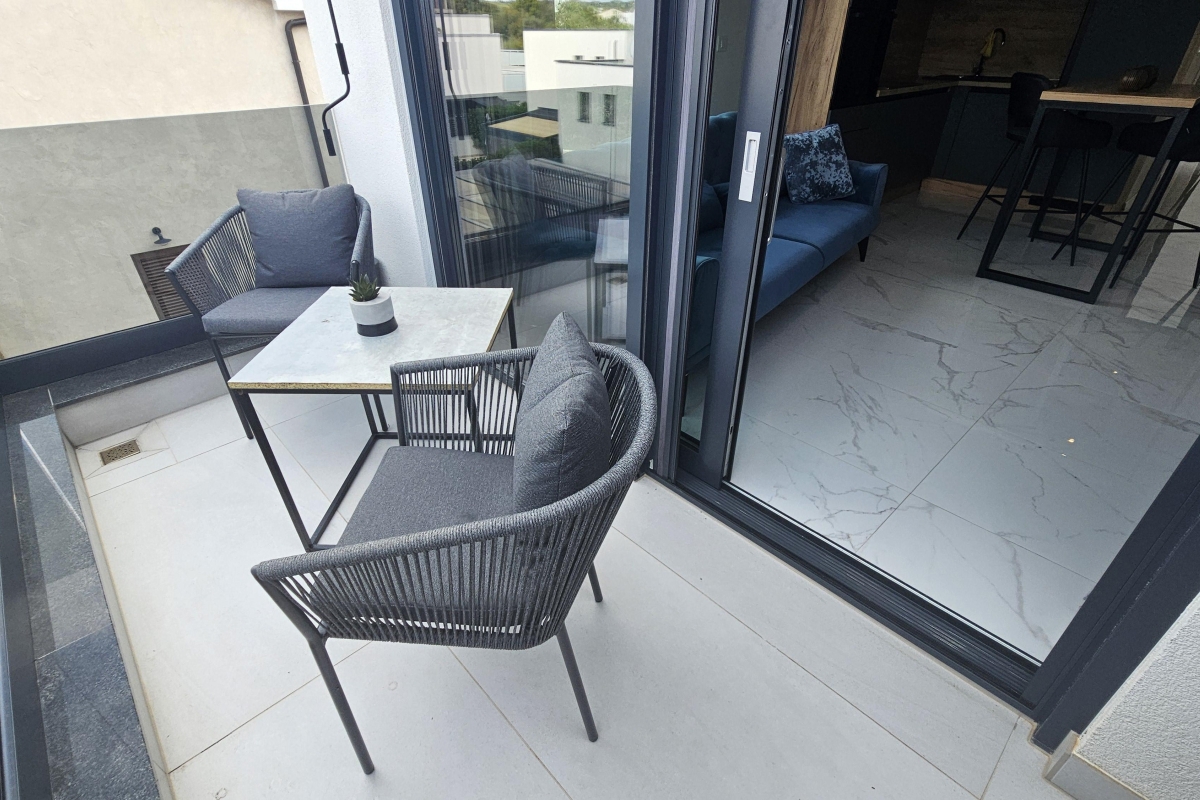 Attico con due zone giorno separate