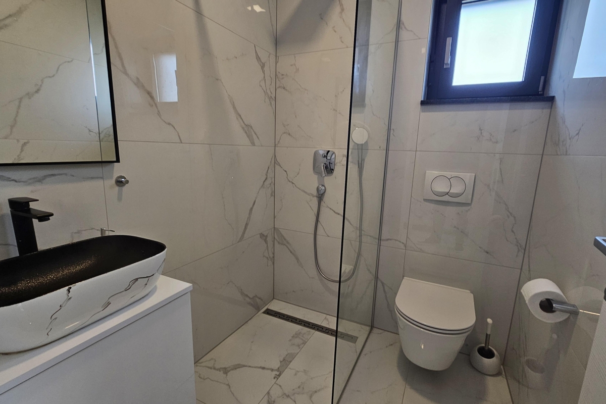 Attico con due zone giorno separate