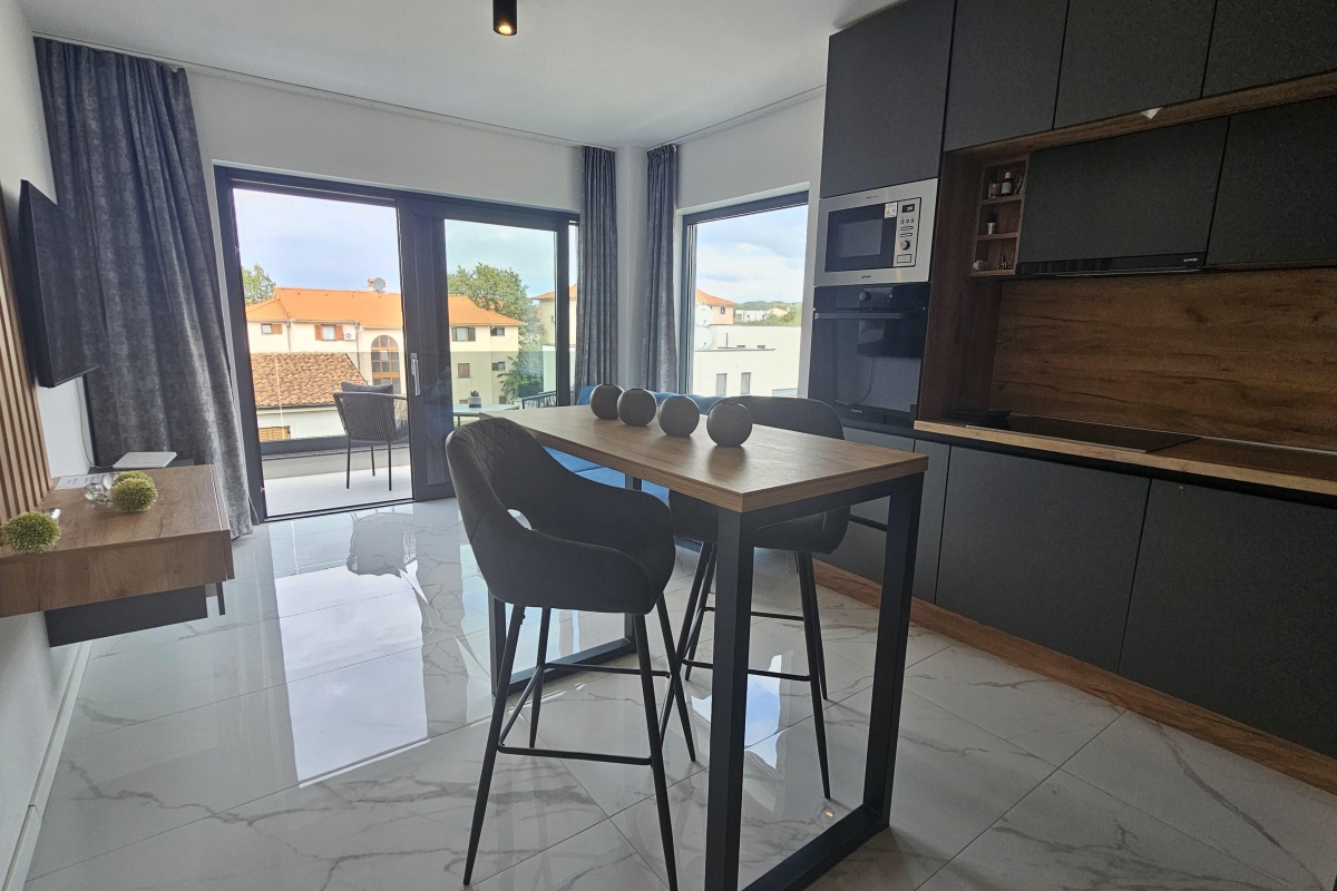 Attico con due zone giorno separate