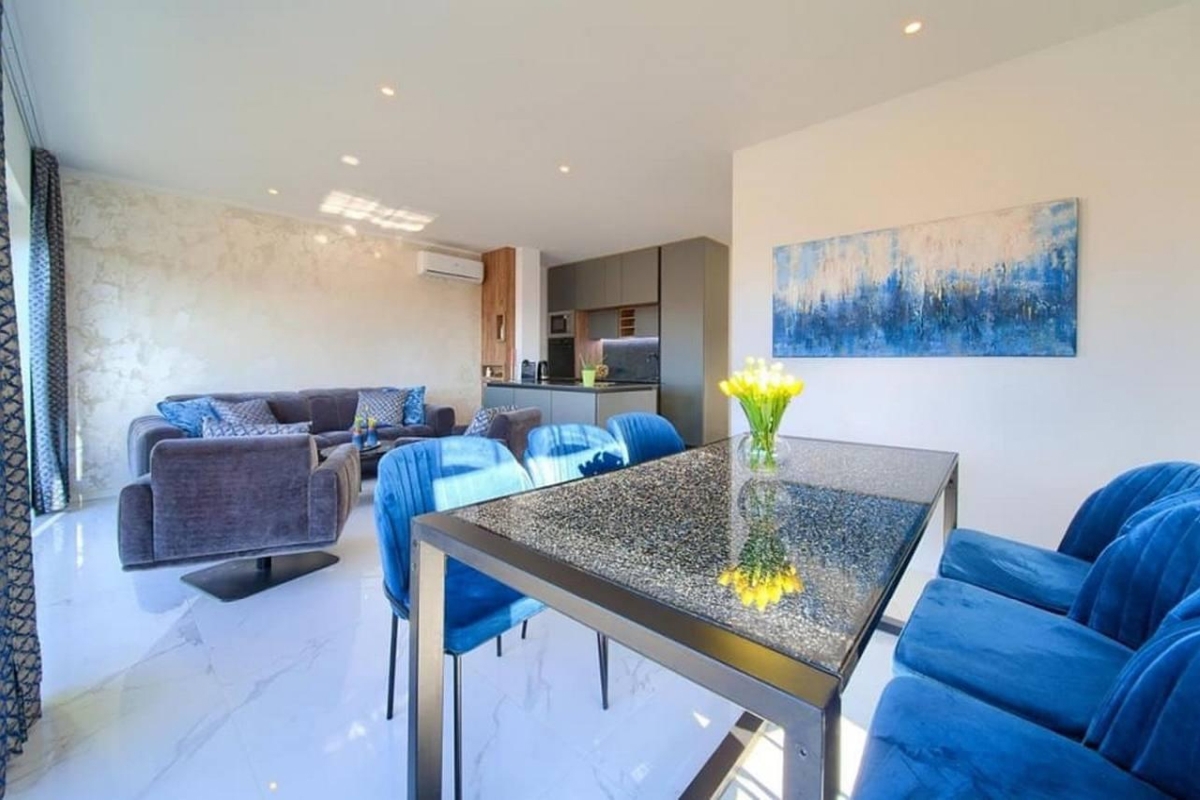 Attico con due zone giorno separate