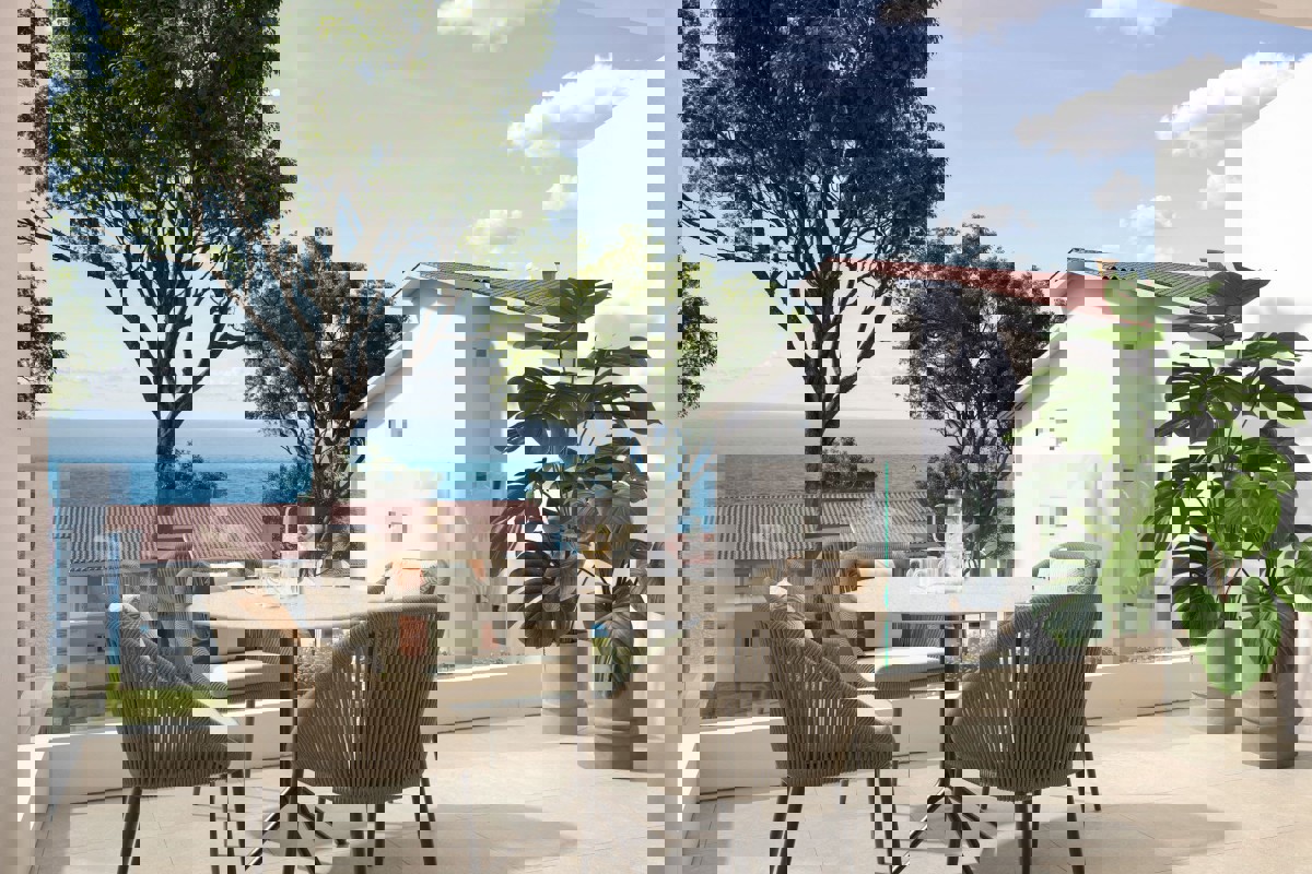 Eleganti residenze con una camera da letto al primo piano, in seconda fila sul mare