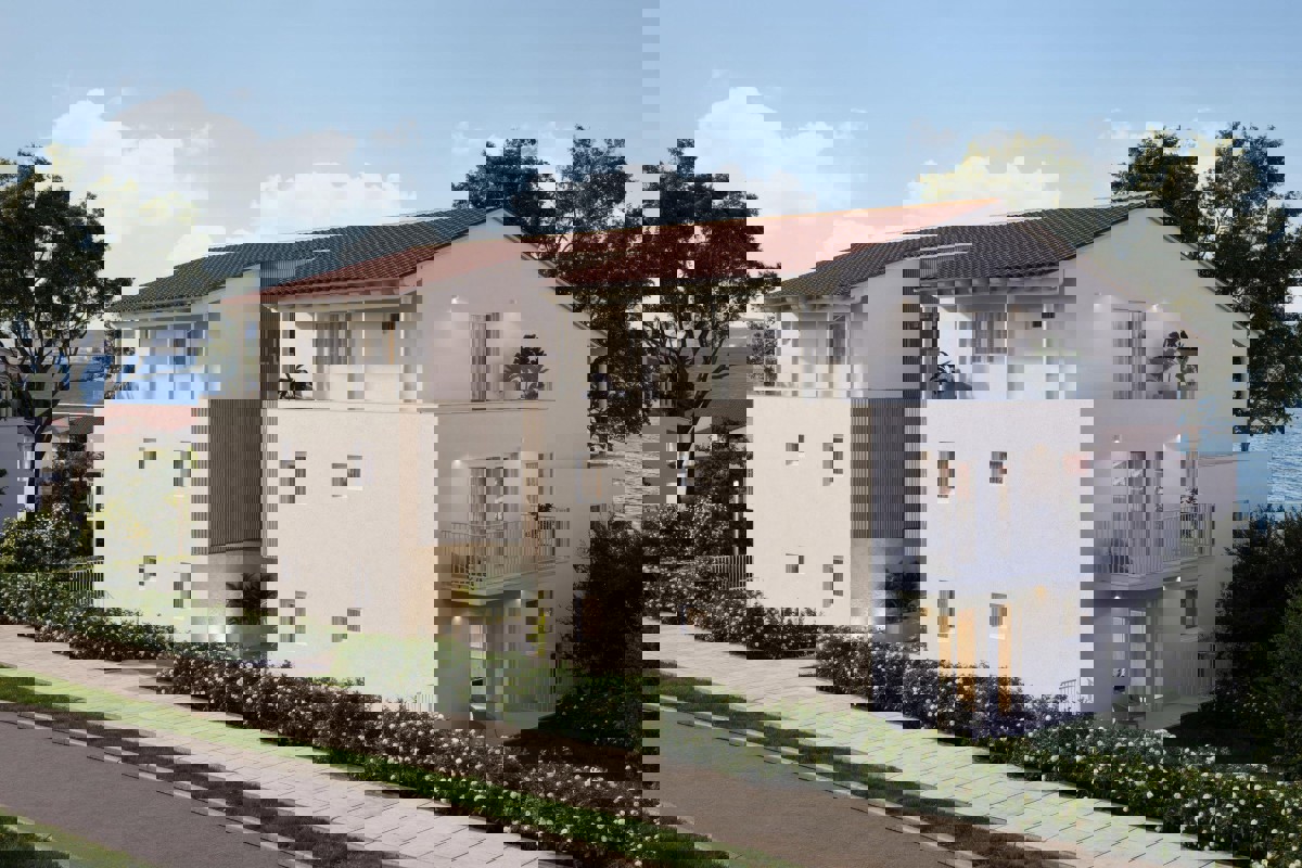 Eleganti residenze con una camera da letto al primo piano, in seconda fila sul mare